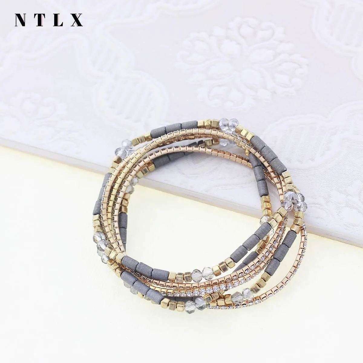 NTLX Multi Strand Beaded Stackable Stretch Bracelets for Women  Bohemian Boho Style Bracelets  Multi Color Layered Statement Bangles